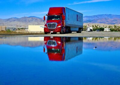 red truck reflection on the ground