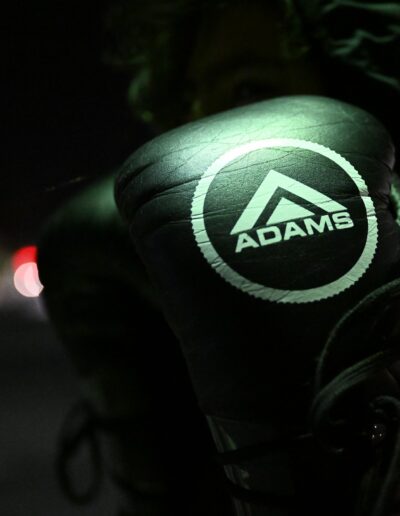 a black gloves with a logo